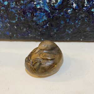 tim loder platypus pottery paper weight